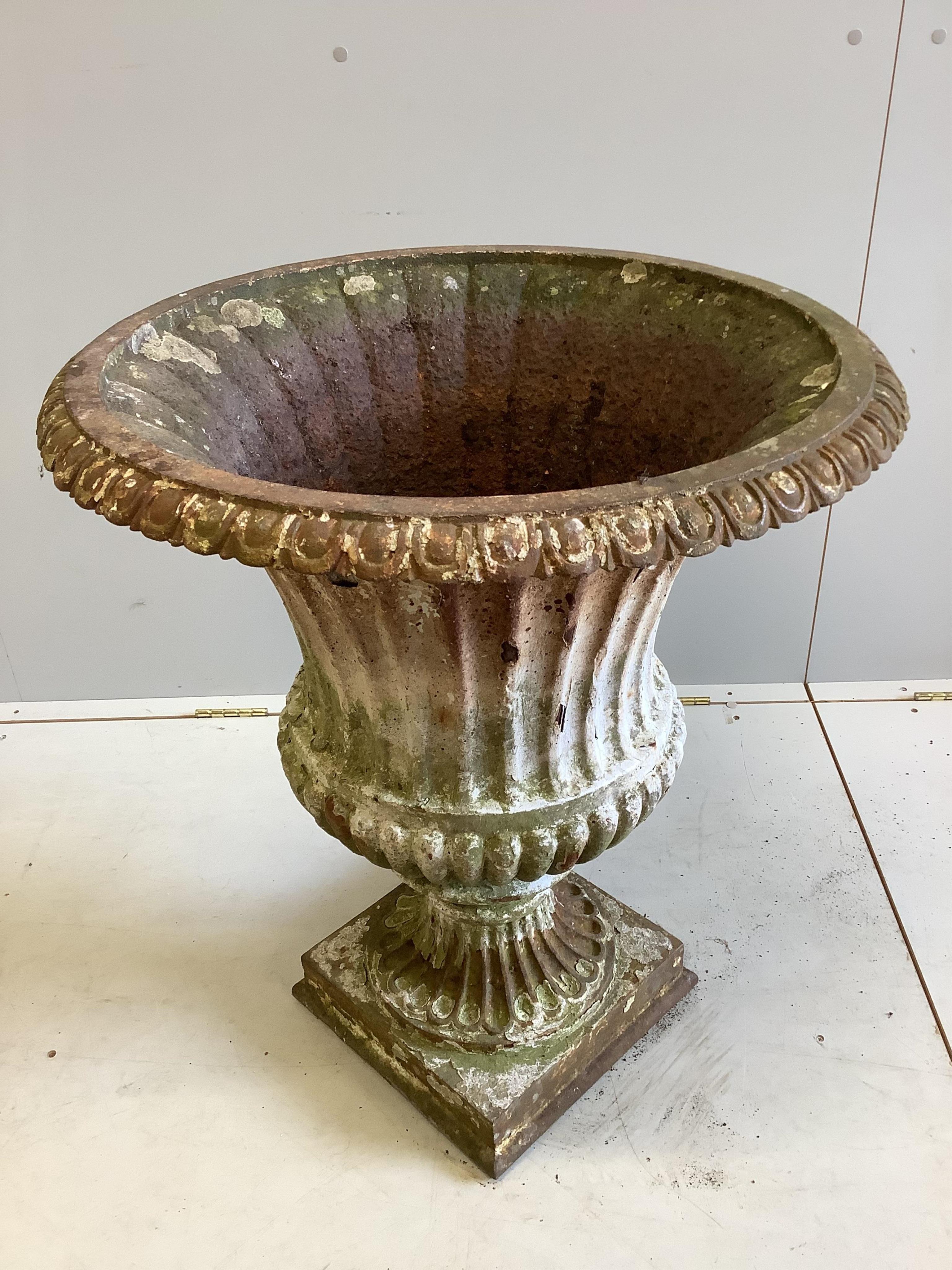 A Victorian painted cast iron campana garden urn, diameter 66cm, height 77cm. Condition - fair